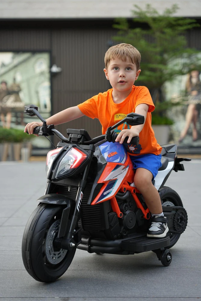 אופנוע סופרמוטו חשמלי לילדים - KTM - קיי.טי.אם דיוק 1290 12V