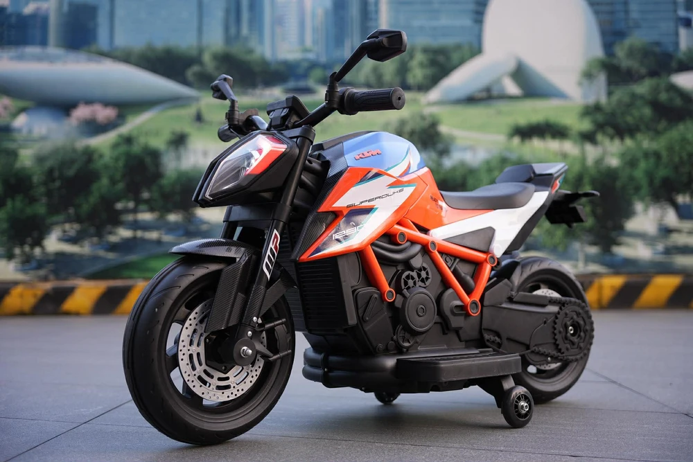 אופנוע סופרמוטו חשמלי לילדים - KTM - קיי.טי.אם דיוק 1290 12V