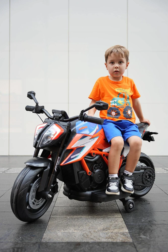 אופנוע סופרמוטו חשמלי לילדים - KTM - קיי.טי.אם דיוק 1290 12V