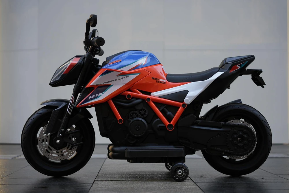 אופנוע סופרמוטו חשמלי לילדים - KTM - קיי.טי.אם דיוק 1290 12V