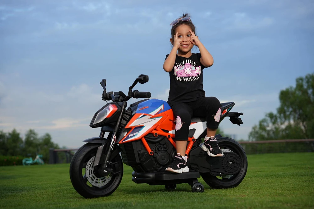 אופנוע סופרמוטו חשמלי לילדים - KTM - קיי.טי.אם דיוק 1290 12V